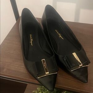 Salvatore Ferragamo Black Flats with Gold Accent